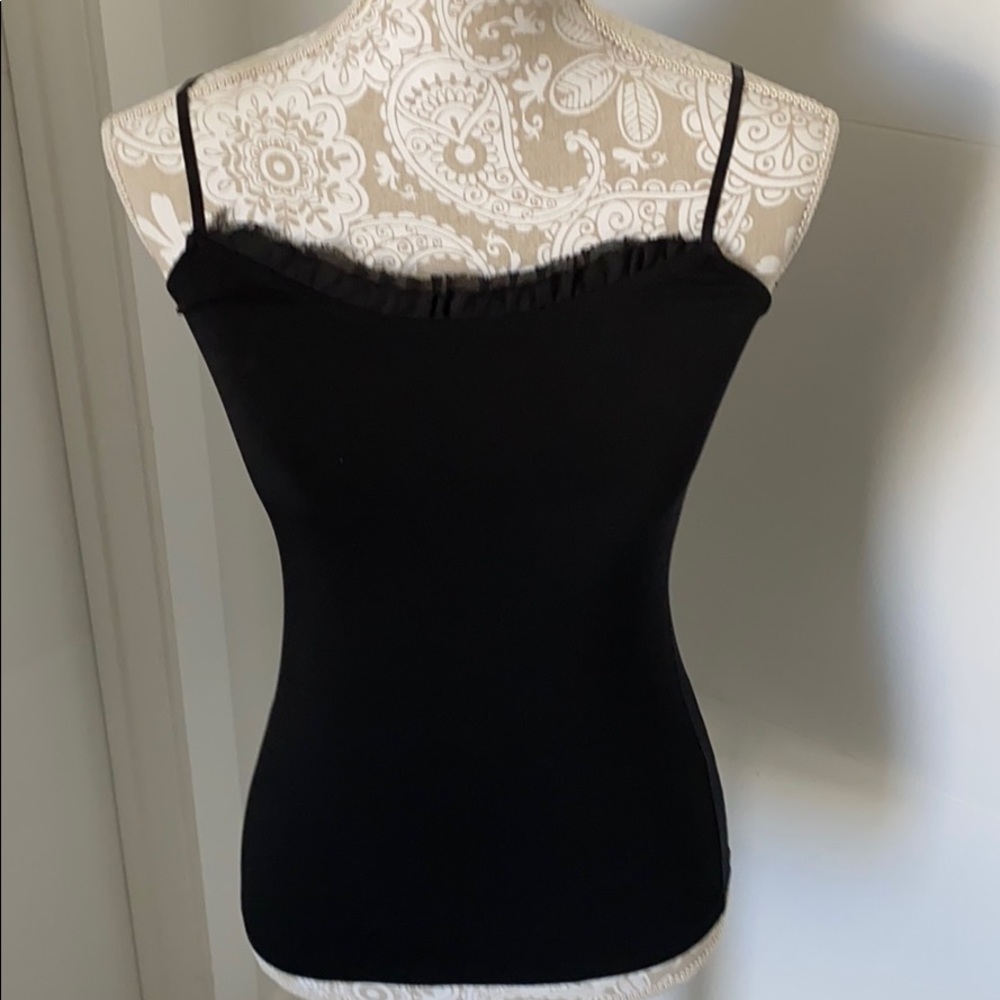 The limited black tank top